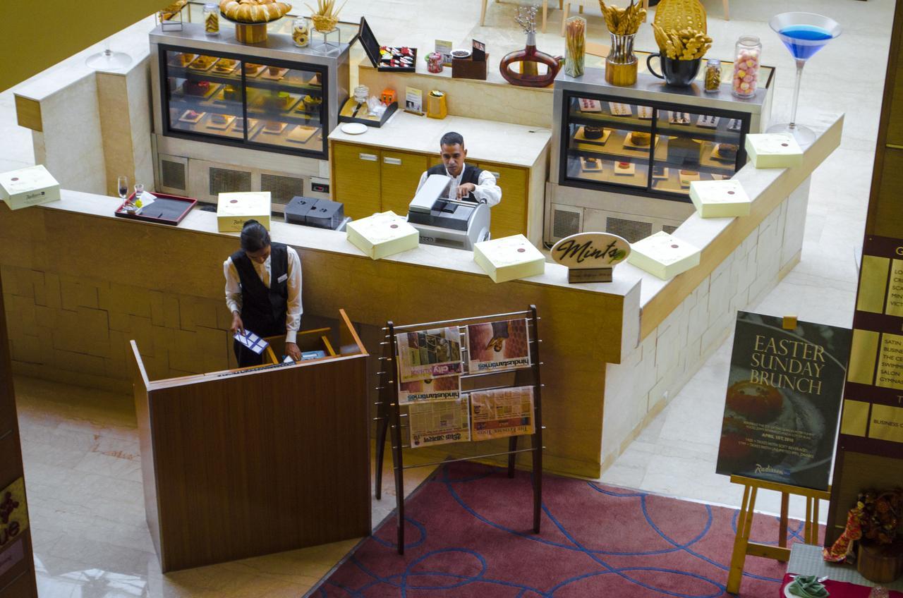Radisson Blu Hotel, Велика Нойда Екстер'єр фото Concierge desk at the Taj Mahal Palace, Mumbai, India